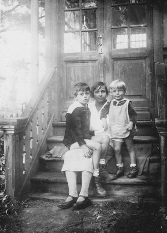 Andrei Sakharov with his younger brother, Yuri, and mother, Yekaterina Alekseyevna, at the dacha. Circa 1928.