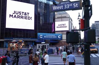 A message was displayed on a giant screen outside Madison Square Garden that the star couple had married. Engraving 