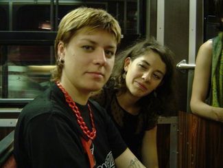 Sasha Volinga with activist and writer Sophie Pinkham at a conference in Toronto. 2006