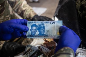 Money found on a mercenary from Nigeria who fought alongside the Russian army. 