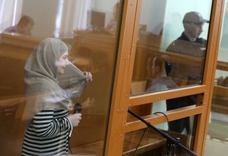 Student Patimat Gadzhiyeva, charged with extremism for posting symbols of the Islamic State on social media, appears at court hearing in Moscow on August 17, 2016.