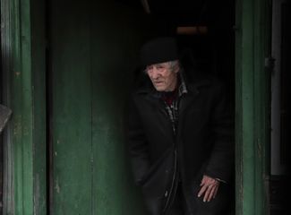 Valentin Vasilenko, 83, was the only resident of Teterivske, a village not far from Kyiv. After Russian troops invaded, Ukrainian forces evacuated Valentin and volunteers found him a new home. March 31, 2022. 