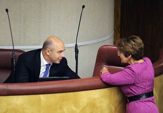 Министр финансов Антон Силуанов и Оксана Дмитриева во время пленарного заседания Госдумы России. Сентябрь 2013-го