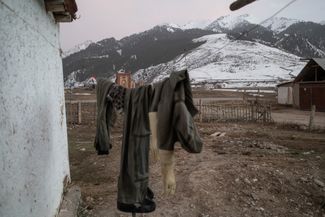 Murat’s protective gear drying outside his home in the village of Tash-Bashat.