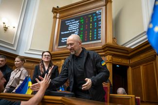 Yulia Svyrydenko (center) and Denys Shmyhal during the prime minister’s resignation proceedings, July 16, 2025.