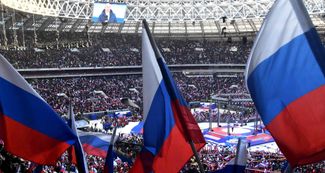 Акция на стадионе «Лужники» в Москве 18 марта 2022 года, в годовщину аннексии Крыма и на исходе первого месяца полномасштабного российского вторжения в Украину