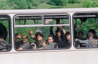Soldiers from the Yugoslavian army after being released from the barracks, where Bosnian Muslim forces blocked them in for a month. June 1992.