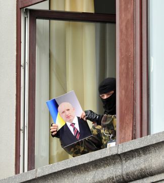 Pro-Russian militants occupy the regional administration building in Luhansk. April 29, 2014.