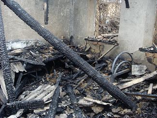 Burned family home of Imran Utsimiev, in the village of Alpatovo, in the Naur district of Chechnya