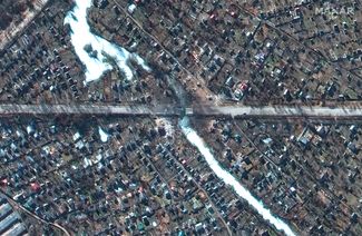 Разрушенный мост и дома в Чернигове, 28 февраля