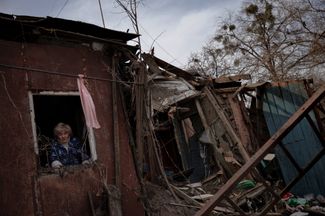 Lydia Mezhiritskaya in her home, which was damaged in an explosion. Kharkiv, April 8, 2022. 