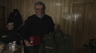 Makhmud Channanov’s Order of Courage and military uniform