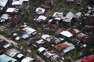 Дома, разрушенные «Мангхутом», в филиппинской провинции Кагаян