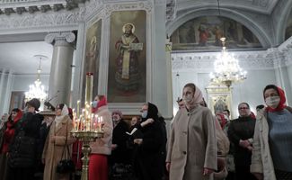Worshippers attend an Easter service at the Troitsky Cathedral in Moscow’s Danilov Monastery, which serves as a headquarters for the Russian Orthodox Church.