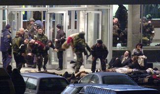 Before raiding the building, police use the ventilation system to flood the theater with knockout gas, after which Interior Ministry forces and FSB agents storm in. Officials say the terrorists’ explosives necessitated the use of knockout gas. The exact makeup of the gas pumped into the theater is still unknown to this day.