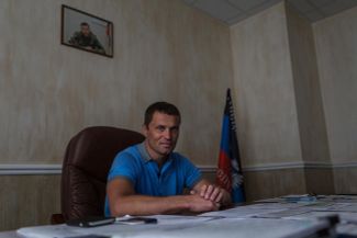 The minister of construction, housing, and public utilities of the Donetsk People's Republic, Sergei Naumets, in his office.