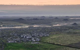 Вид на разрушенную Марьинку — город на окраине Донецка. 11 мая 2023 года. Руины города были окончательно захвачены ВС РФ только в конце декабря