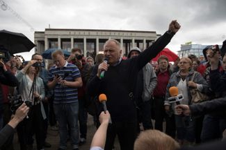 Opposition leader Mikalai Statkevich rallies supporters in Minsk’s Kastrycnickaja Square ahead of a march after the annual Independence Day celebrations on July 03, 2017
