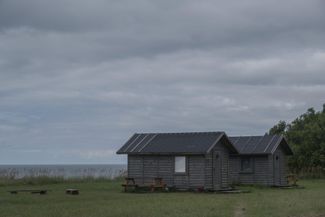 The summer cottages by the cliff on Andersone’s property. July 2024. 