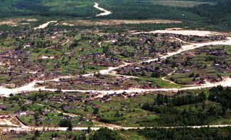 An aerial view of the site of the former village, 2001