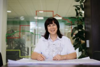 Ирина Шведова в офисе, июль 2018 года