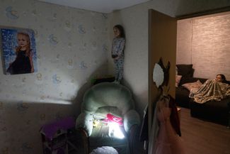 A six-year-old girl shows me her room before going to bed