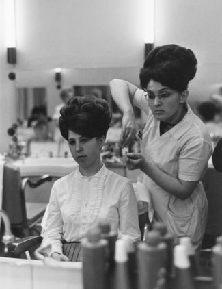 Beauty salon on Gorky Street. The beehive updo hairstyle. 1963.