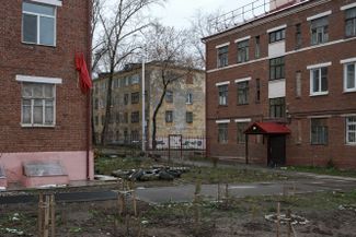 The yard between 13 Tsiolkovsky Street and 11 Tsiolkovsky Street.