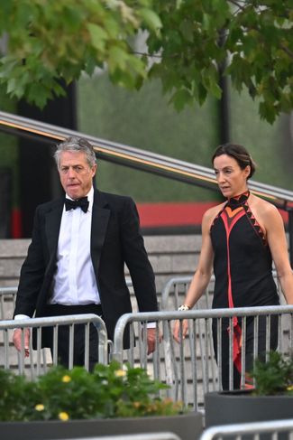 Hugh Grant and his wife, Anna Elizabeth Eberstein, arrive at Madison Square Garden. July 3, 2026