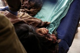 Тело сиделки, которая ухаживала в Кфар-Аза за пожилыми людьми. 10 октября 2023 года