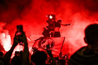 Celebrating Paris Saint-Germain's victory in Paris