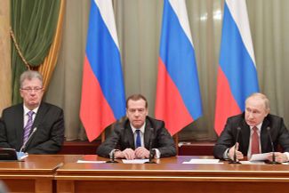 From left to right: Deputy Prime Minister Sergey Prikhodko, Prime Minister Dmitry Medvedev, and President Vladimir Putin at an end-of-the-year cabinet meeting, December 26, 2017