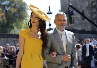 Актер и режиссер Джордж Клуни с женой, правозащитницей Амаль Клуни
