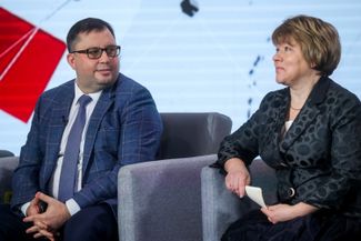 Federal Antimonopoly Service deputy head Timofey Nizhegorodtsev with Elena Maksimkina