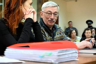 Oleg Orlov and his defense attorney, Katerina Tertukhina, in court on February 26, 2024