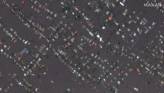 Вид на затопленный город Алешки со спутника. 7 июня 2023 года