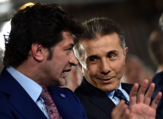 Ivanishvili is photographed sitting next to Tbilisi Mayor Kakha Kaladze after being elected as Georgian Dream’s chairman at a party congress in Tbilisi. May 11, 2018.