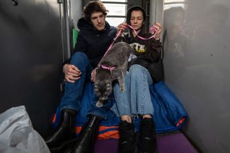 Passengers on the train from Kyiv to Warsaw. February 25, 2022.
