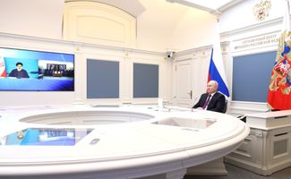 Vladimir Putin meets with Ebrahim Raisi via video link during the signing of the Rasht–Astara railway agreement. May 17, 2023.