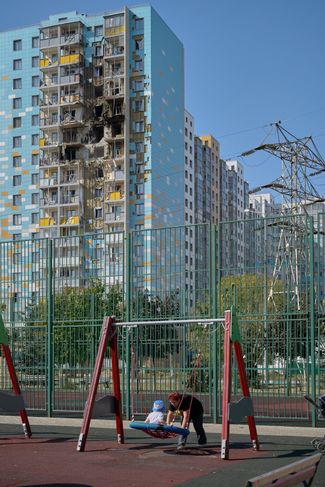 The damaged apartment building at 6 Sportivny Proezd