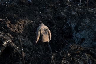 A crater left by a Russian air strike on a residential area in Zaporozhye on March 11, 2026.