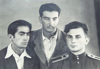 1950. Yevgeny Primakov (center) with friends.