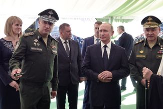 Timur Ivanov, Vladimir Putin, and Sergey Shoigu visit Patriot Park. September 19, 2018.