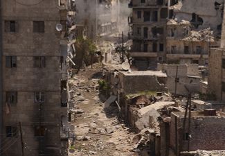 Алеппо после бомбардировки, март 2013 года