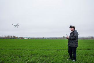 Georgy Alburov launching a drone. October 11, 2016.