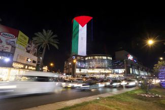 Проекция палестинского флага на торговом центре в Багдаде. 7 октября 2023 года