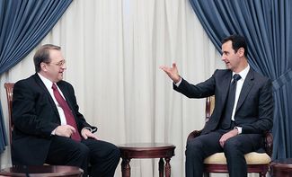 A meeting between Syrian President Bashar al-Assad (right) and Mikhail Bogdanov, special representative for Vladimir Putin. December 10, 2014.
