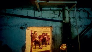 Residents of Stepanakert hide in a basement during shelling. October 2, 2020.