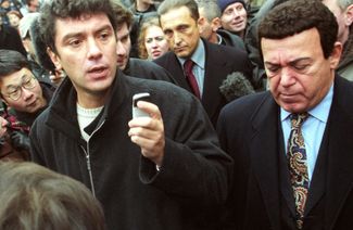 Boris Nemtsov, the leader of the Union of Right Forces political party, and State Duma deputy Joseph Kobzon in talks with the terrorists on October 24. During the day, Nemtsov, Kobzon, and other negotiators made several visits to the seized theater and negotiated the release of several hostages.