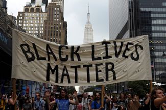Марш протеста под эгидой Black Lives Matter в Нью-Йорке. 7 июля 2016 года